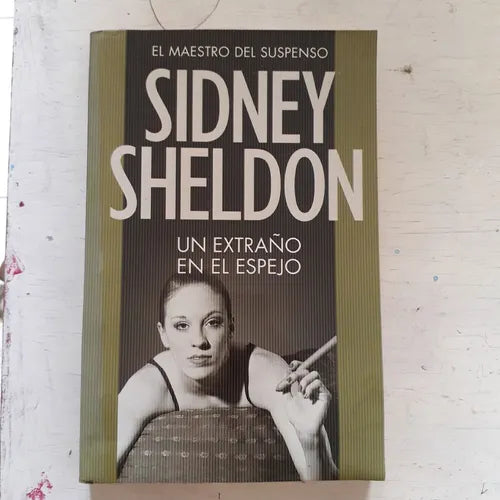 Libro usado en venta: Un extra?o en el espejo de Sidney Sheldon; editorial Emece impreso en 2009 realizamos envios a todo el mundo.1