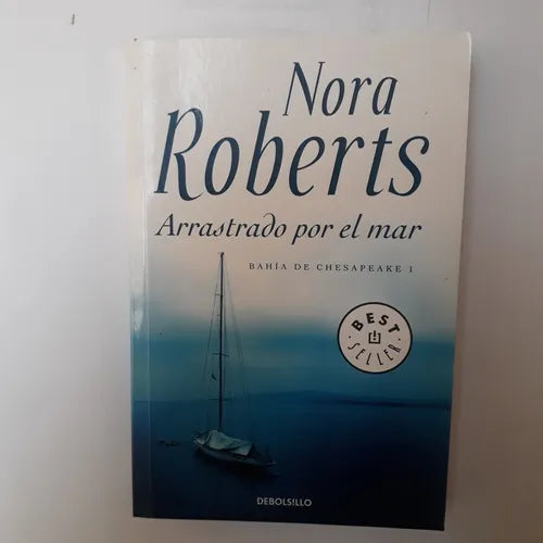 Libro usado en venta: Arrastrado por el mar de Nora Roberts; editorial DeBolsillo impreso en 2014 realizamos envios a todo el mundo.1