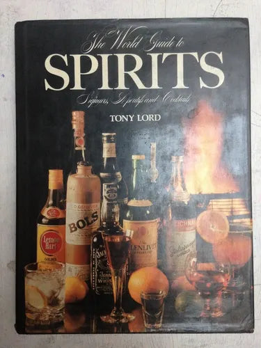 Libro usado en venta: The world guide to spirits aperitifs and cocktails de Tony Lord; editorial Quarto Book impreso en 1979 envios a todo el mundo.1
