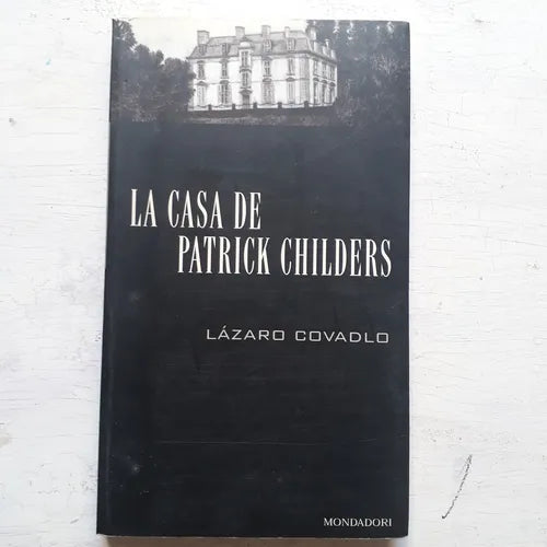 Libro usado en venta: La casa de Patrick Childers de Lazaro Covadlo; editorial Grijalbo impreso en 1999 realizamos envios a todo el mundo.1