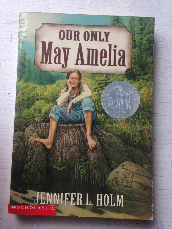 Libro usado en venta: Our only May Amelia de Jennifer L. Holm; editorial Scholastic impreso en 2000 realizamos envios a todo el mundo.1