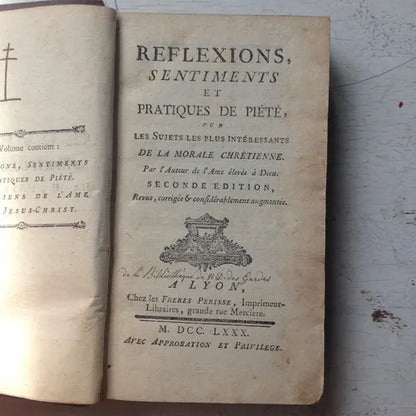 Libro usado en venta: Reflexions, sentiments et pratiques de piete de L'Ame elevee a Dieu; editorial Chez les Freres Perisse impreso en 1780.1