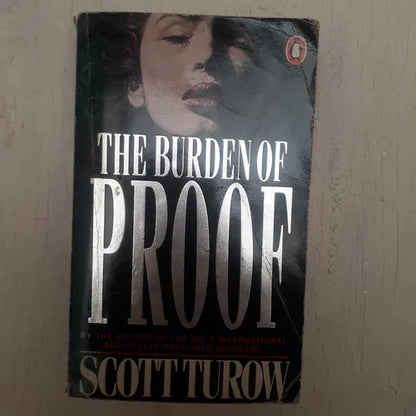 Libro usado en venta: The burden of Proof de Scott Turow; editorial Penguin Books impreso en 1991 realizamos envios a todo el mundo.1