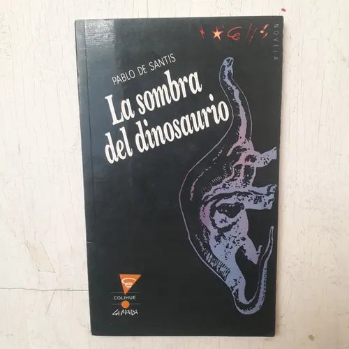 Libro usado en venta: La sombra del dinosaurio de Pablo De Santis; editorial Colihue impreso en 2001 realizamos envios a todo el mundo.1
