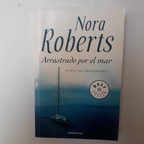 Libro usado en venta: Arrastrado por el mar de Nora Roberts; editorial DeBolsillo impreso en 2014 realizamos envios a todo el mundo.1