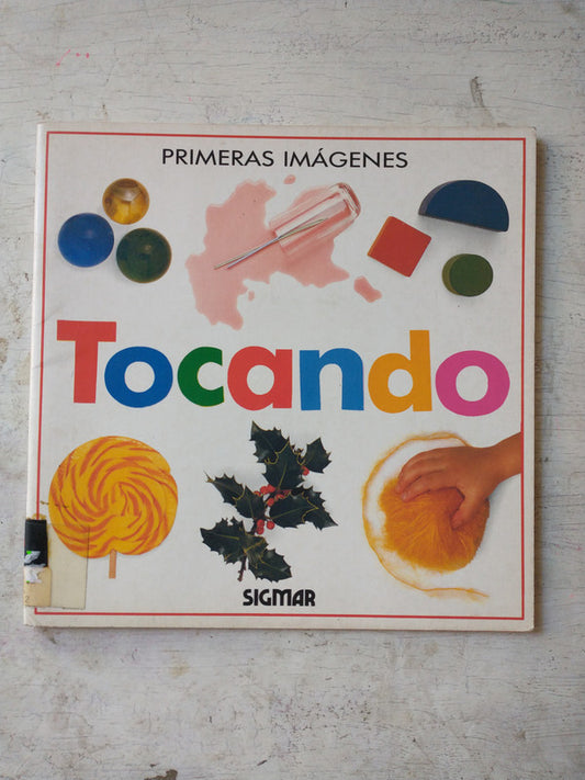 Libro usado en venta: Tocando - Primeras im?genes; editorial Sigmar impreso en 1992 realizamos envios a todo el mundo.1