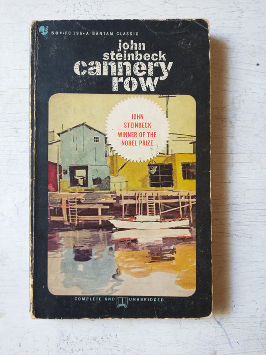 Libro usado en venta: Cannery Row de John Steinbeck; editorial Bantam impreso en 1963 realizamos envios a todo el mundo.1