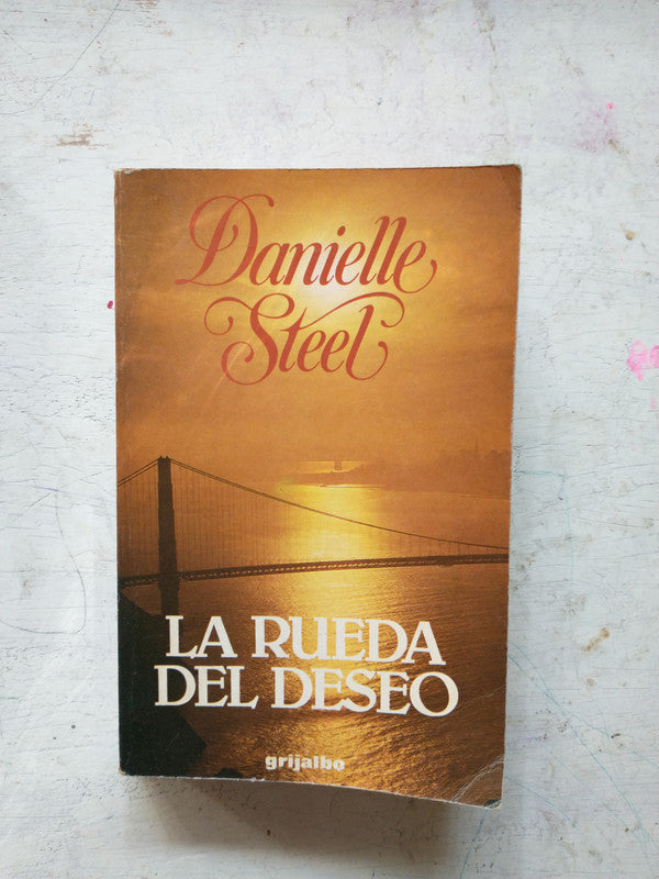 Libro usado en venta: La rueda del deseo de Danielle Steel; editorial Grijalbo impreso en 1985 realizamos envios a todo el mundo.1