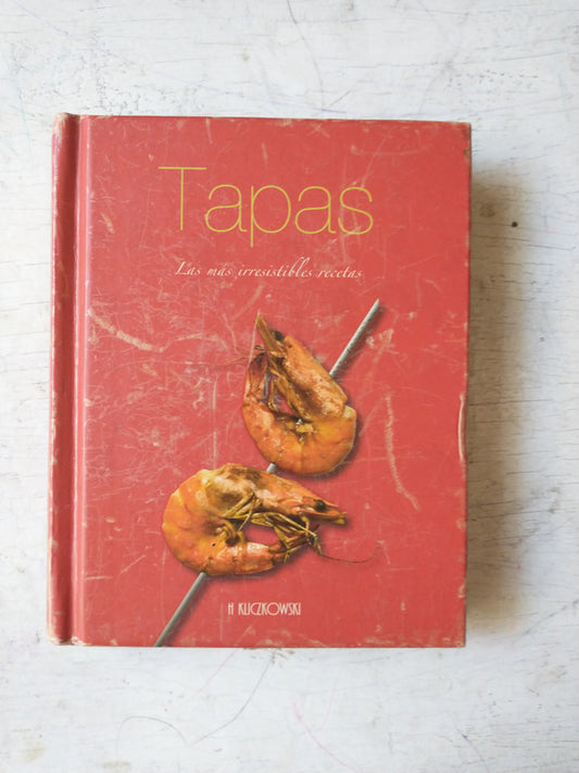 Libro usado en venta: Tapas - Las mas irresistibles recetas; editorial Parragon impreso en 2011 realizamos envios a todo el mundo.1