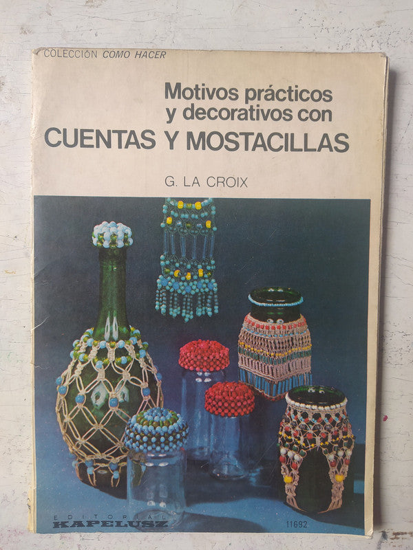Libro usado en venta: Motivos practicos y decorativos con cuentas y mostacillas de G. La Croix; editorial Kapelusz impreso en 1976.1
