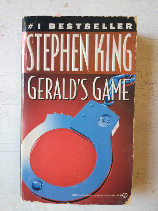 Libro usado en venta: Gerald's Game de Stephen King; editorial Signet impreso en 1993 realizamos envios a todo el mundo.1