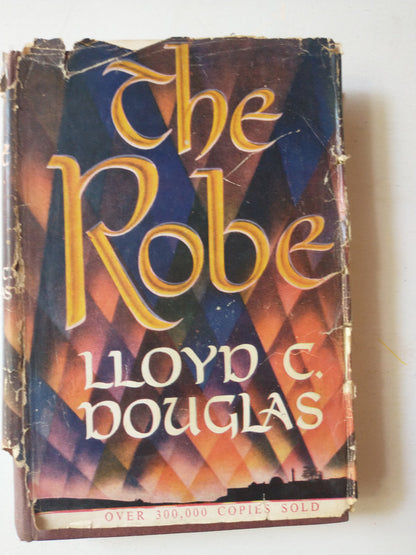 Libro usado en venta: The robe de Lloyd C. Douglas; editorial The Windmill Press impreso en 1947 realizamos envios a todo el mundo.1